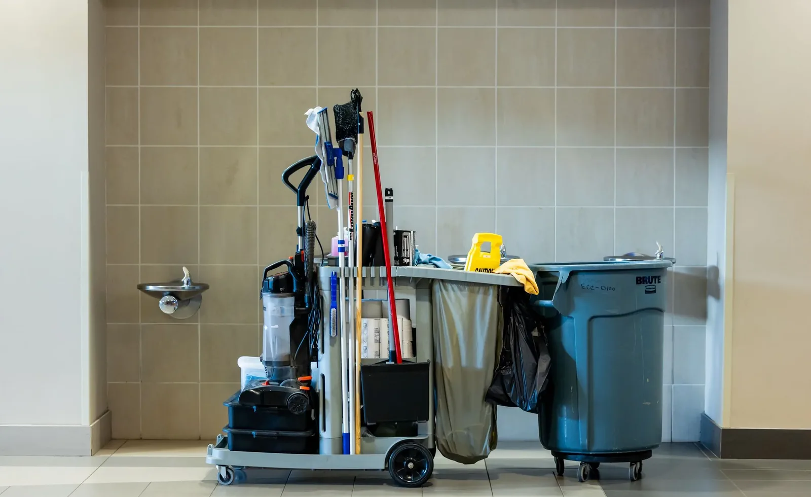 Professional cleaning trolley with tools arranged before work begins